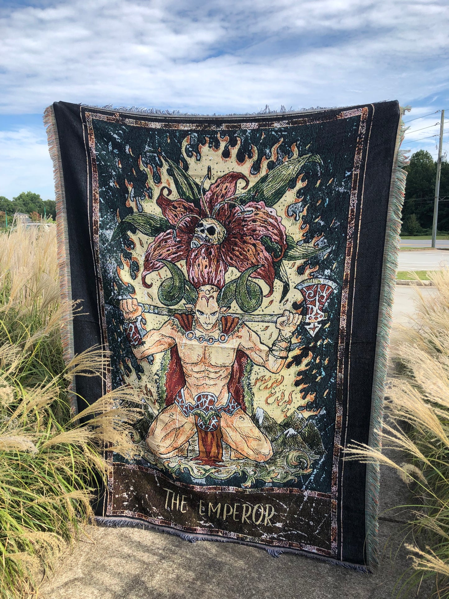 The Emperor - Tarot Card Throw Blanket/ Woven Tapestry holding up in the middle of a field