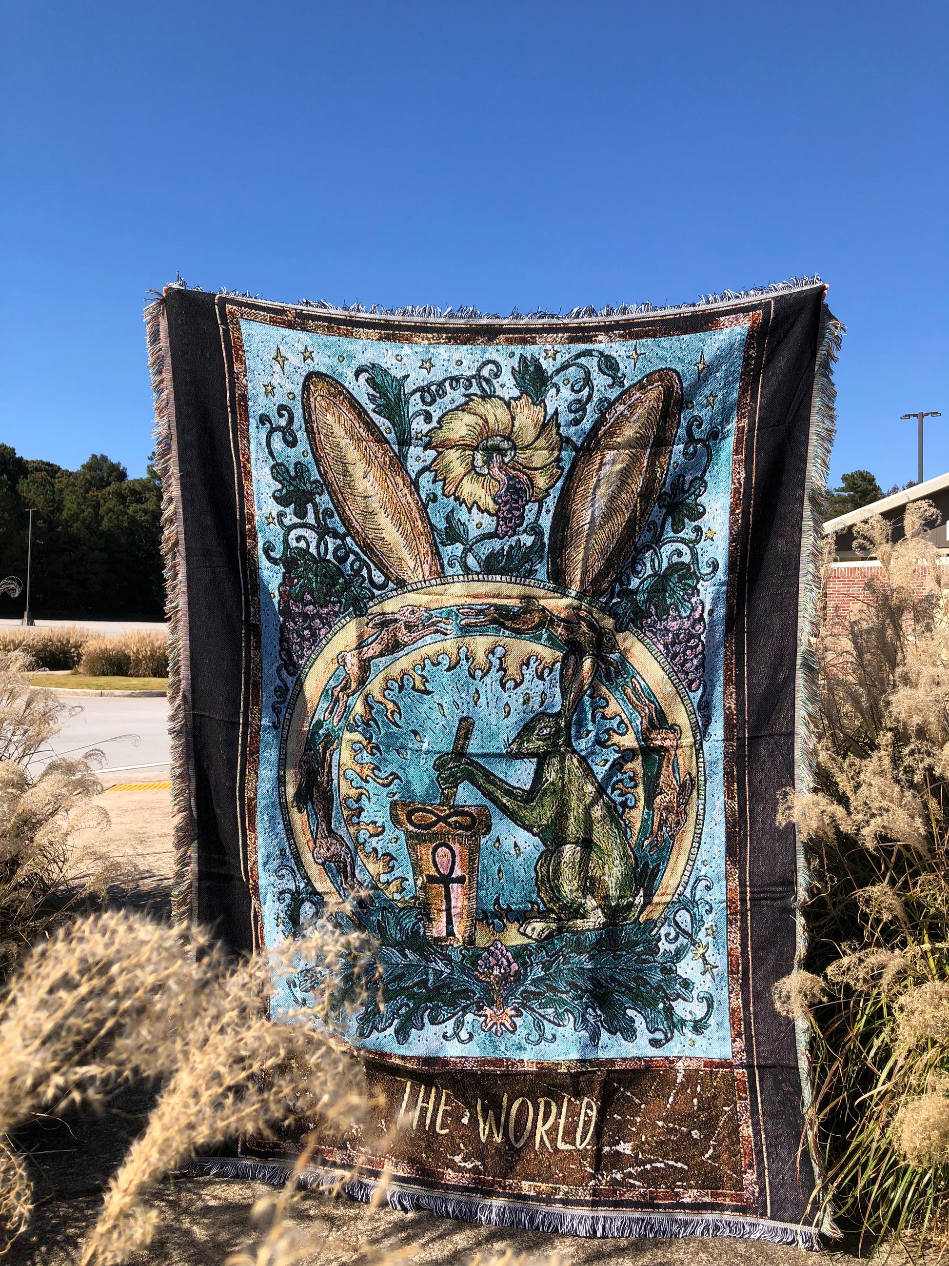 The World - Tarot Card Throw Blanket/ Woven Tapestry in the middle of a field