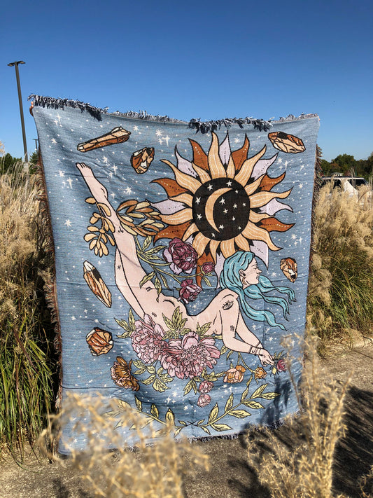 The Mystical Goddess - Throw Blanket/Woven Tapestry holding up in the middle of a field