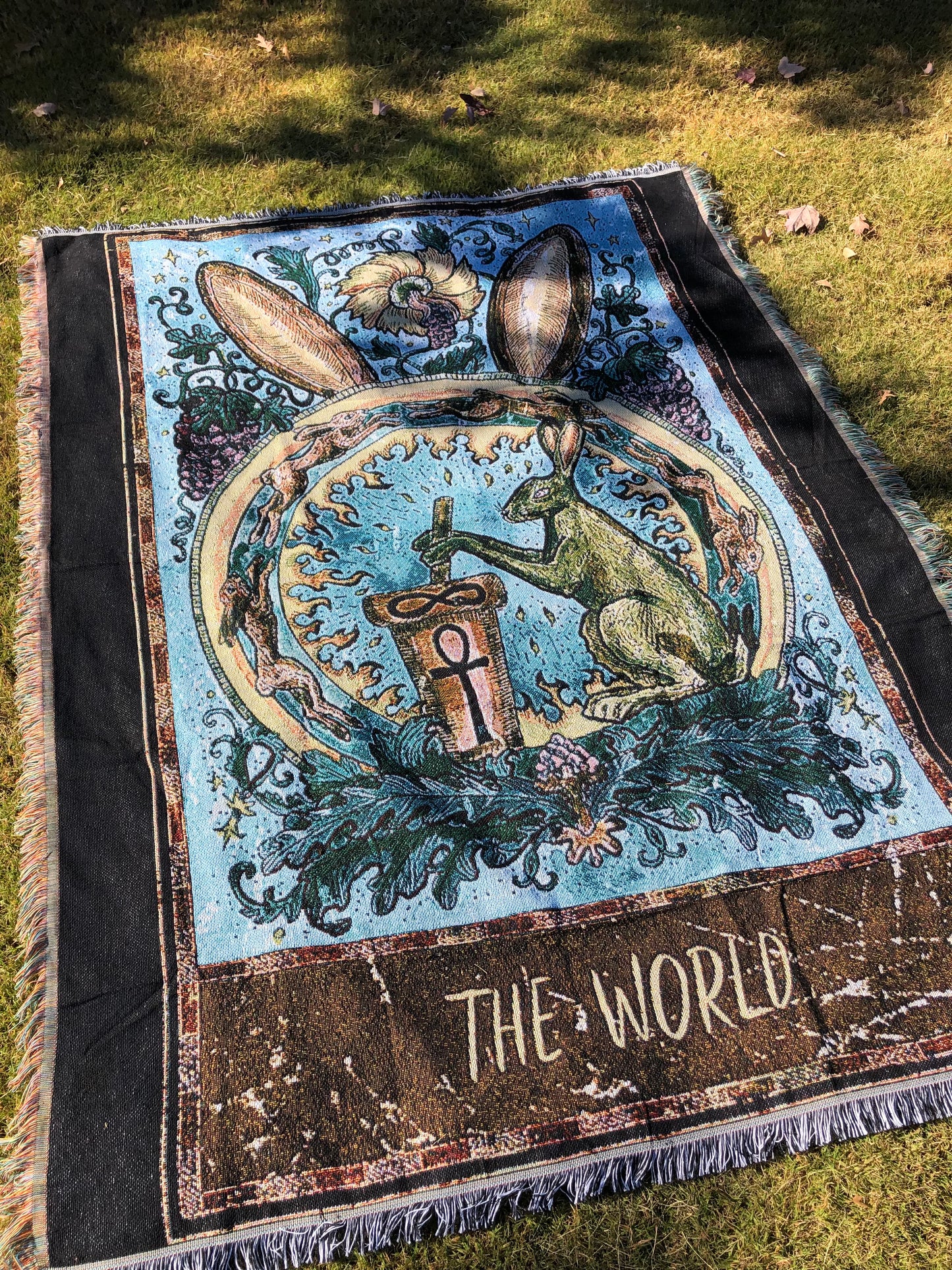 The World - Tarot Card Throw Blanket/ Woven Tapestry on the grass