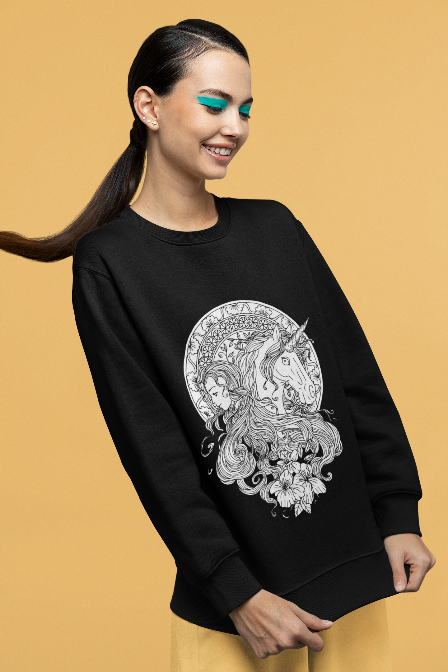 A smiling girl wearing a black Line Art Caribbean Current Princess and Magic Unicorn Sweatshirt