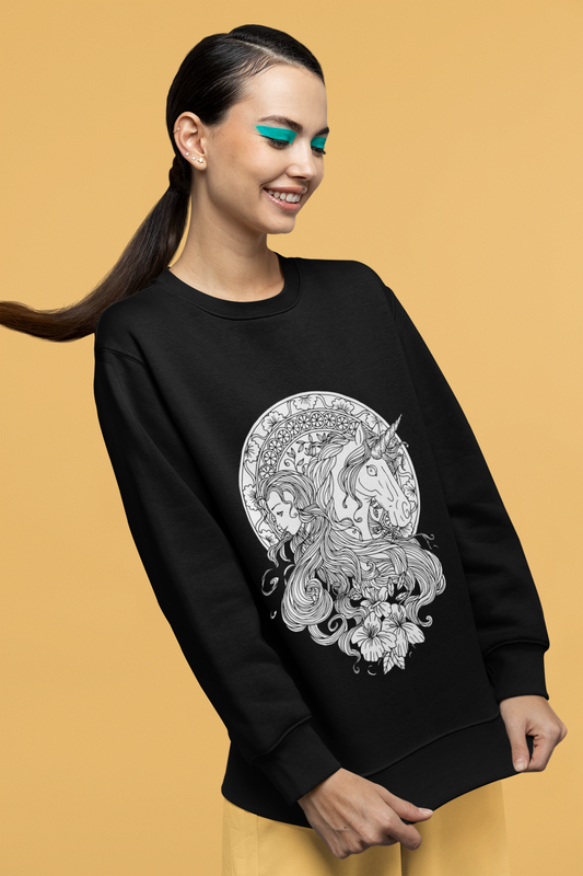 A smiling girl wearing a black Line Art Caribbean Current Princess and Magic Unicorn Sweatshirt