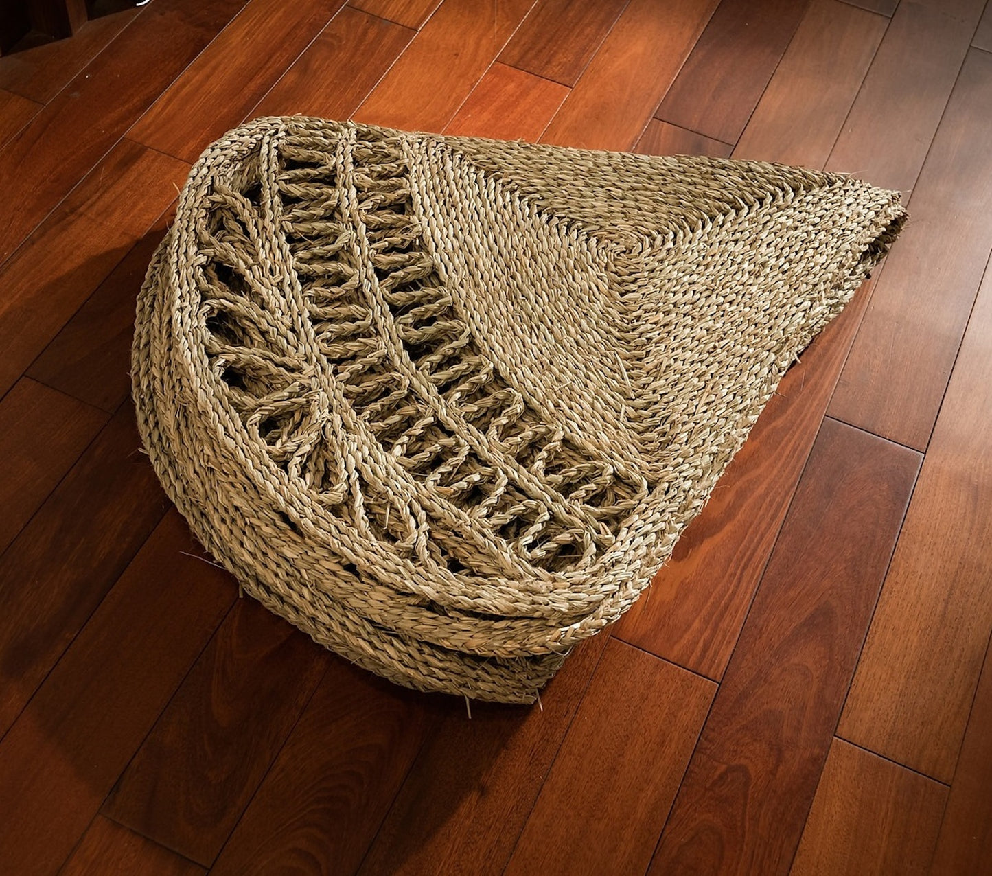 A folded Flower Seagrass Rug