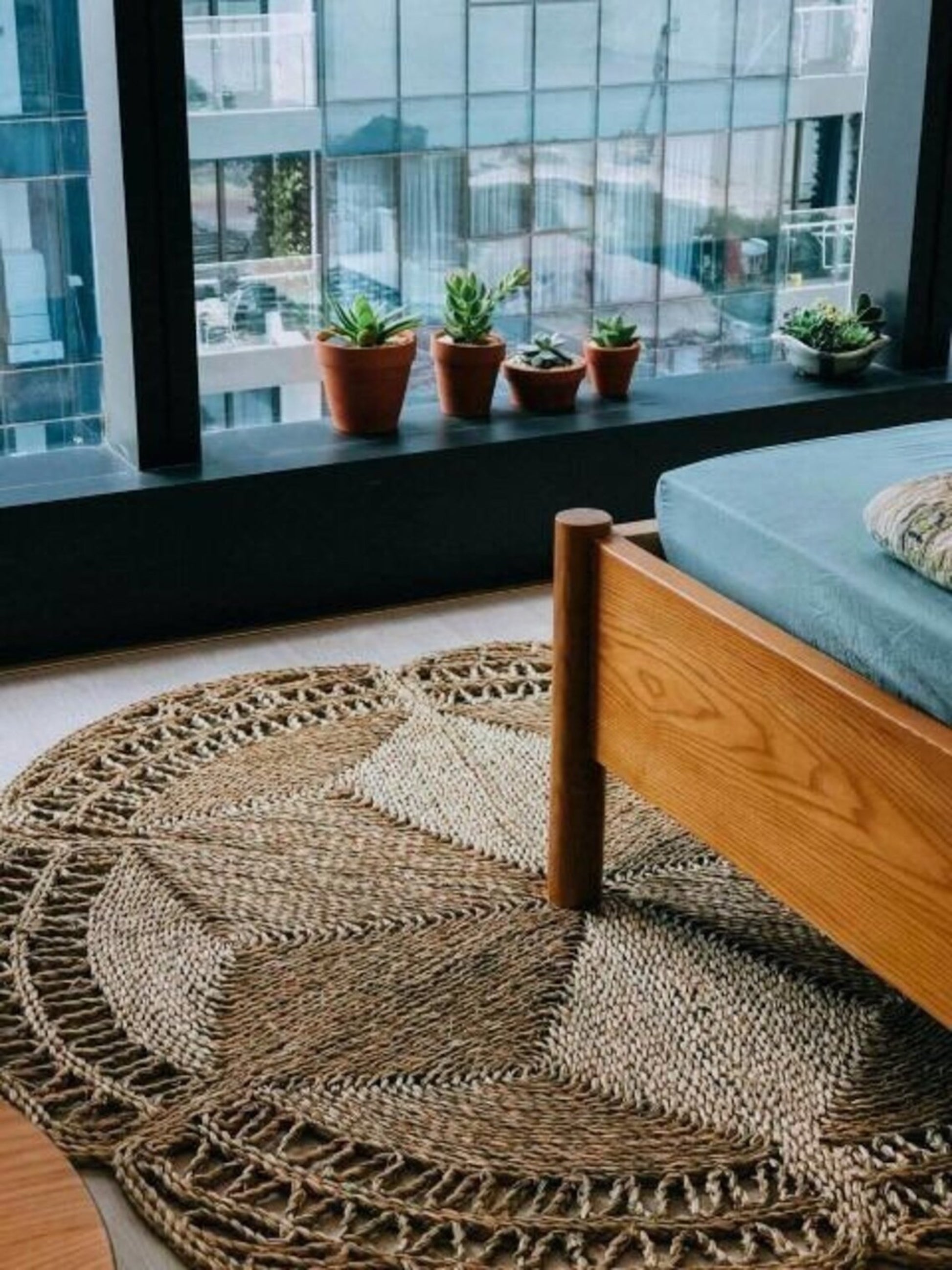 Flower Seagrass Rug in a bedroom