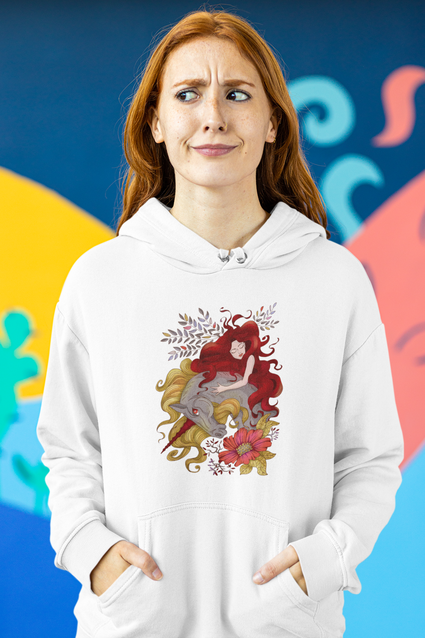 A red haired woman with a confused look wearing a white Red Princess and Magic Unicorn Hoodie