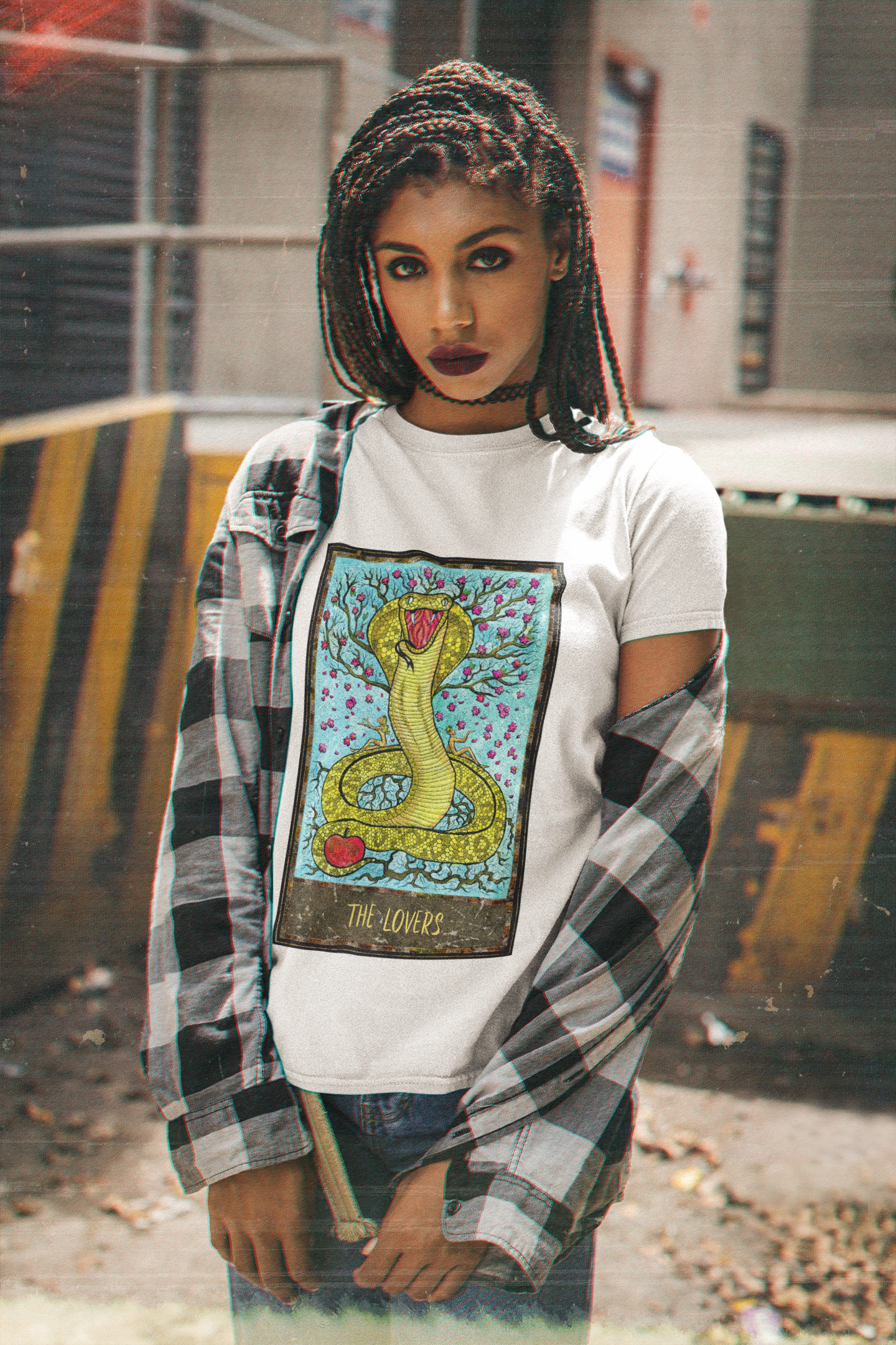 A woman wearing a white The Lovers Tarot Card T-Shirt inside a black and white check pattern shirt and jeans