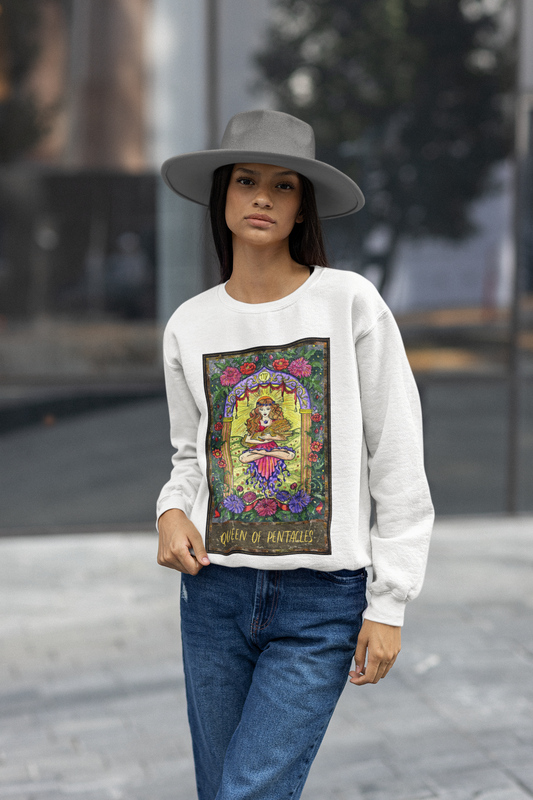 A woman wearing gray hat, white Queen of Pentacles Tarot Card Sweatshirt, and blue jeans