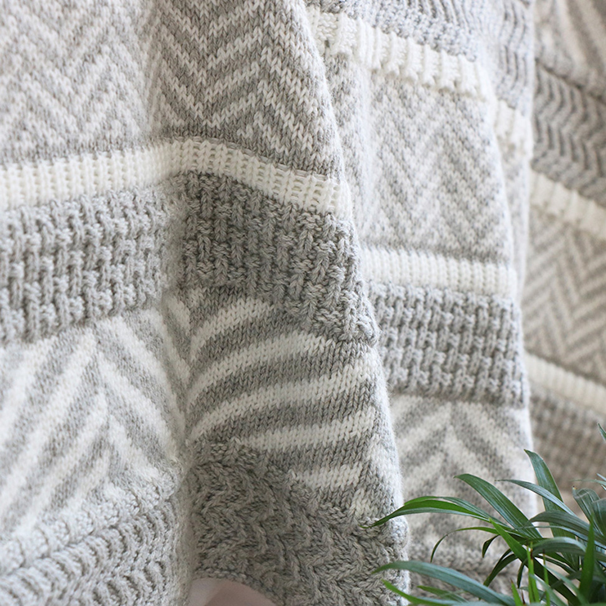 Close up shot of the Hem Soft Bohemia Gray Knitted Throw Blanket