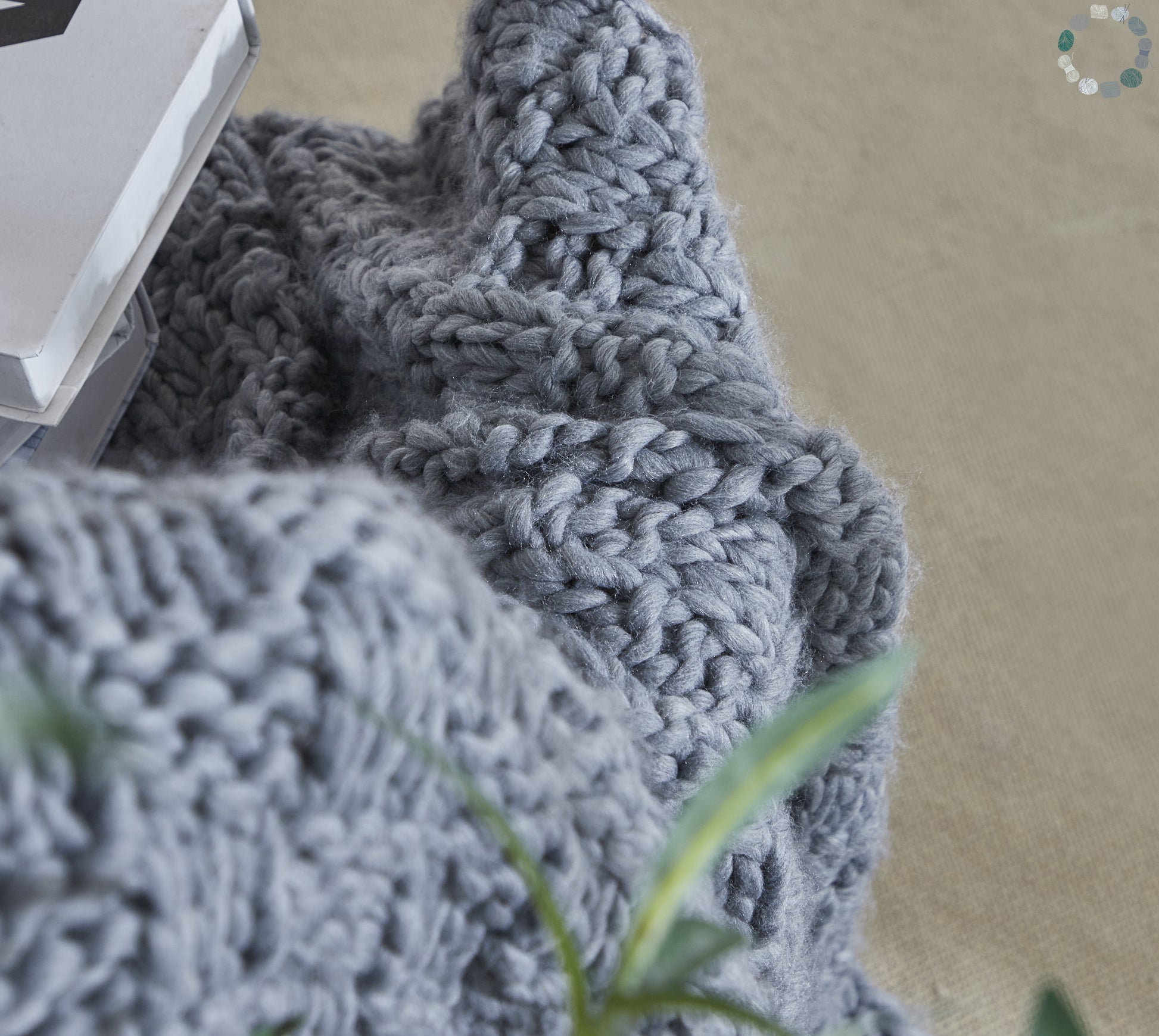 Close up shot of the Iceland Yarn Dark Gray Thick Knitted Throw Blanket