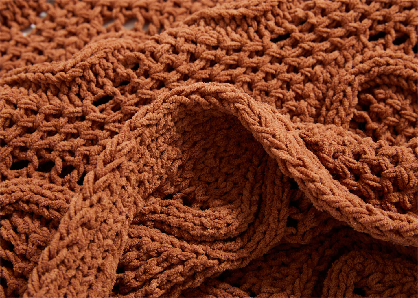 close up shot of rusty orange Pompom Fringes Solid Chenille Knitted Throw Blanket