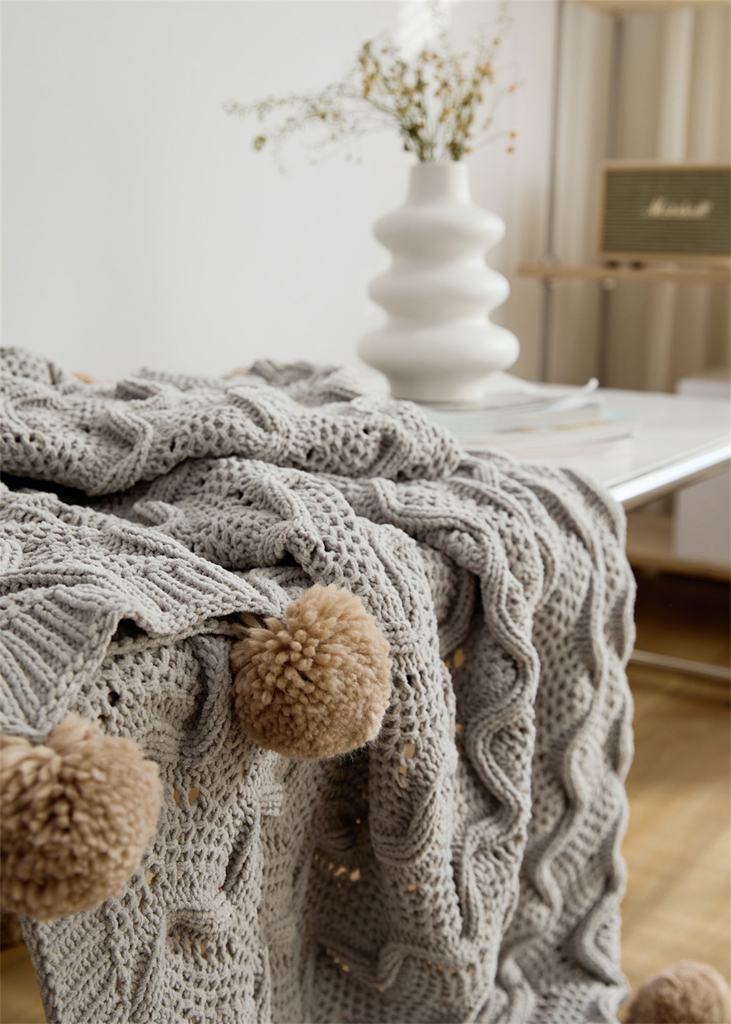 close up shot of the gray Pompom Fringes Solid Chenille Knitted Throw Blanket