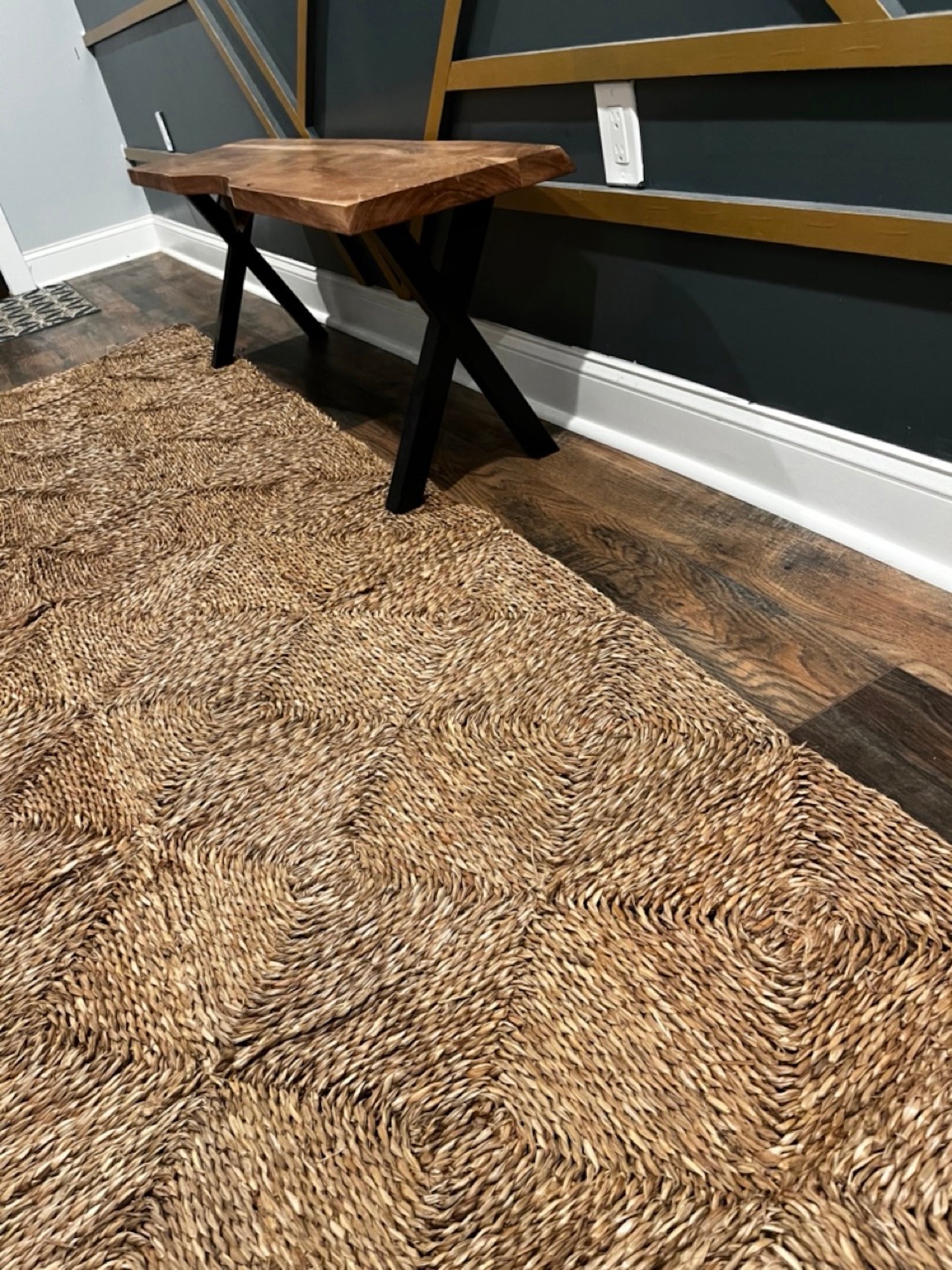 semi close up shot of the Rectangle Seagrass Rug in the hallway