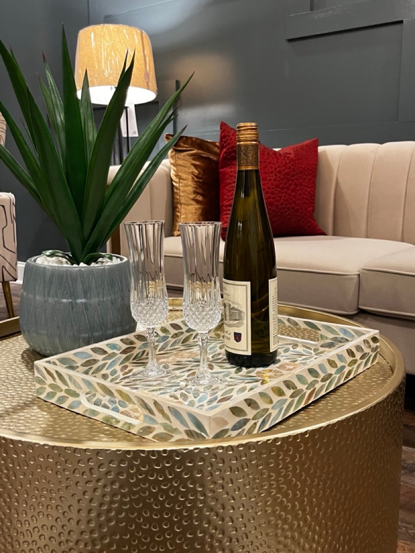 Turquoise Rectangle Flower Pattern Mother of Pearl Tray on the living room table with glasses and a bottle