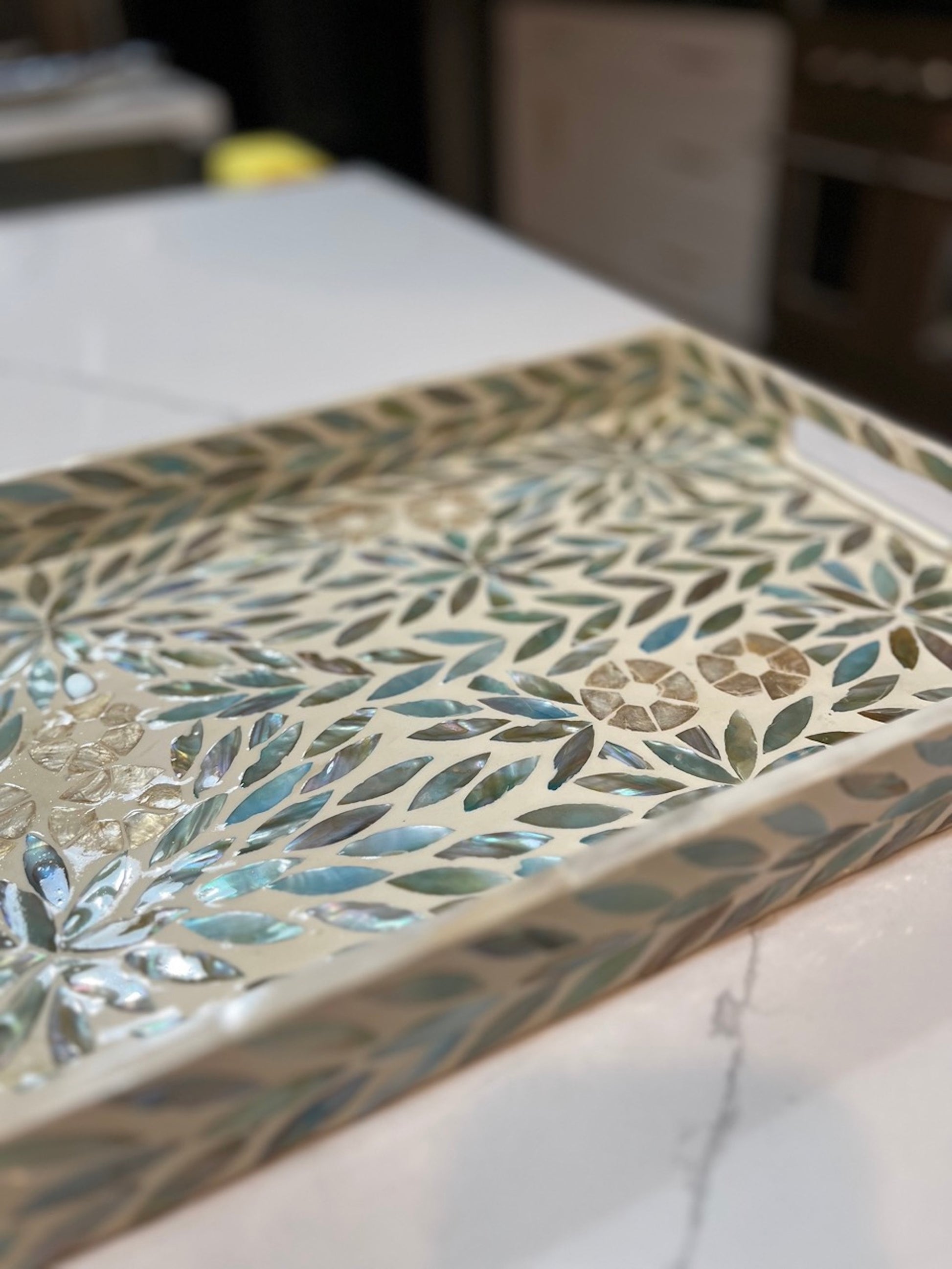 Close up shot of Turquoise Rectangle Flower Pattern Mother of Pearl Tray on the kitchen counter