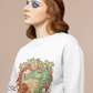 A woman with euphoria inspired makeup wearing a white Cocoa Brown Princess and Magic Unicorn Sweatshirt