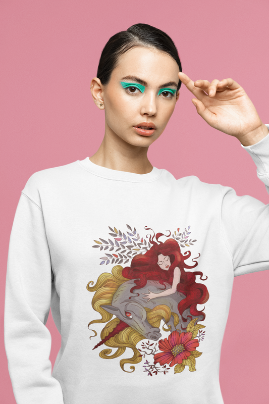 A woman with euphoria inspired makeup posing at a studio wearing a white Red Princess and Magic Unicorn Sweatshirt