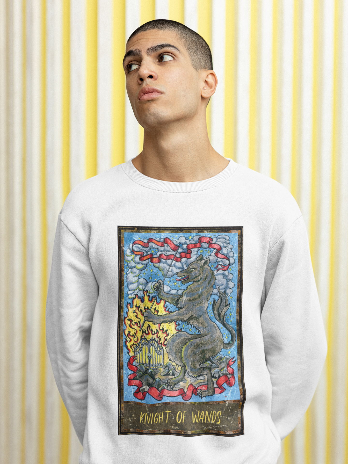 A man with a buzz cut, wearing a white Knight of Wands Tarot Card Sweatshirt