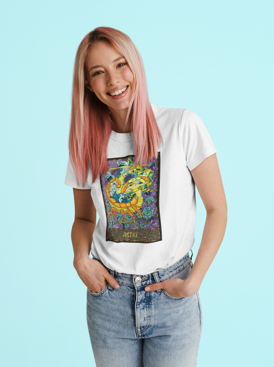 A rose gold haired woman wearing a white Justice - Tarot Card T-shirt and blue jeans