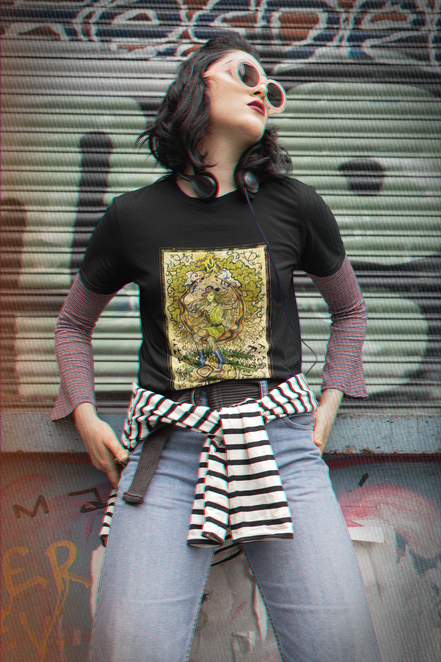 A woman with sunglasses wearing a black The Fool Tarot Card T-Shirt, a red inner shirt, blue jeans with a stripe shirt tying around the waist