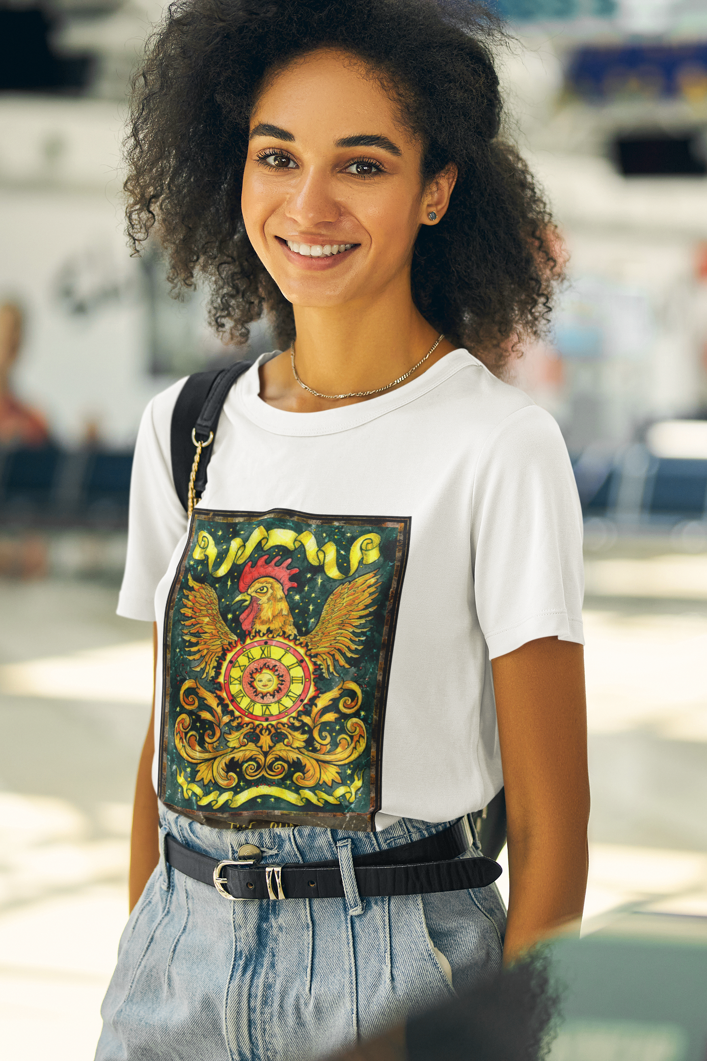 A woman wearing a white The Sun Tarot Card T-Shirt and blue jeans